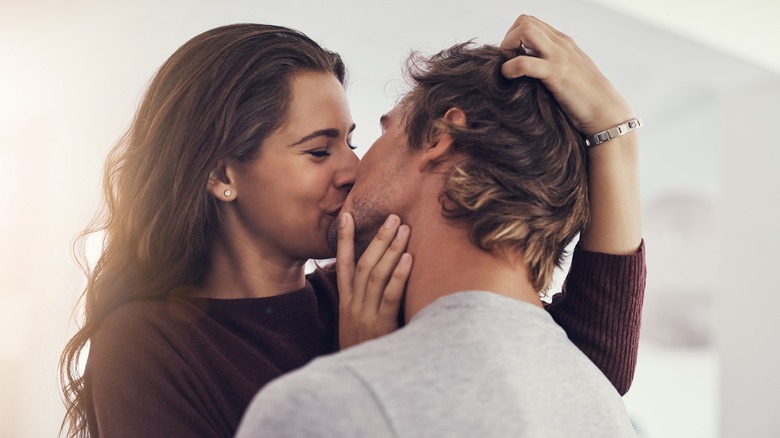 A couple kissing 