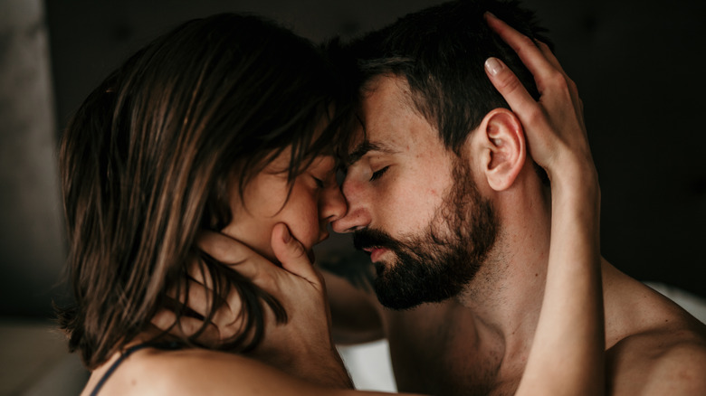 A couple kissing 