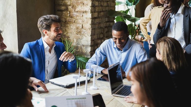 office colleagues at table