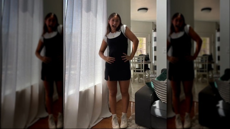 Woman wearing T-shirt under dress