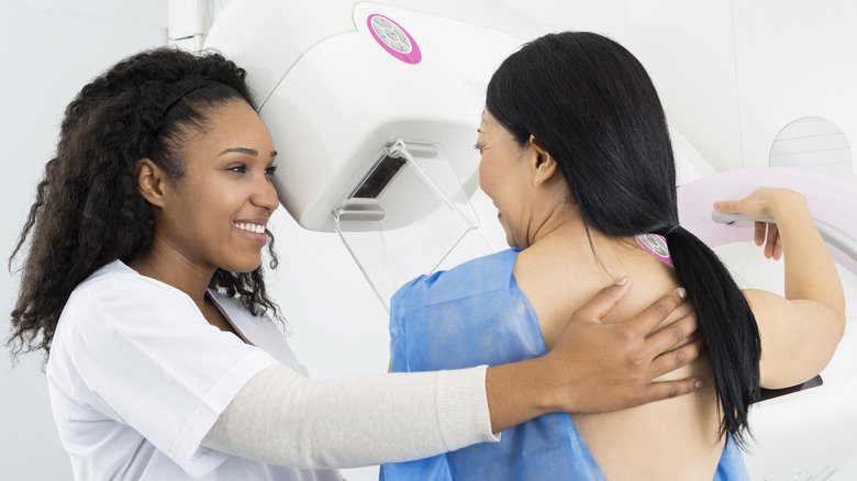 woman getting mammogram