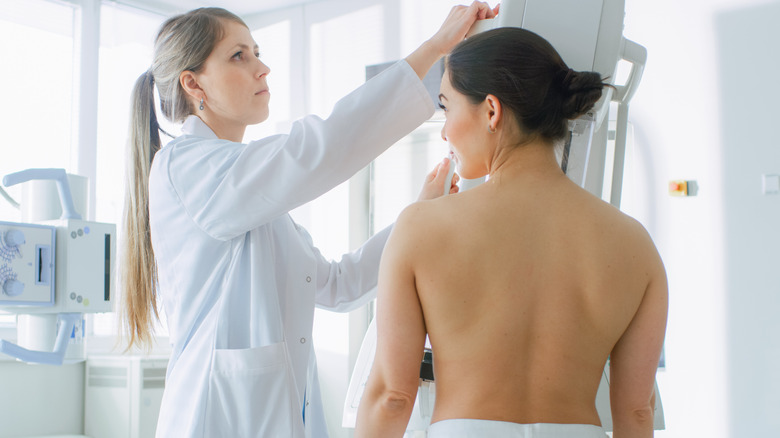 woman getting mammogram