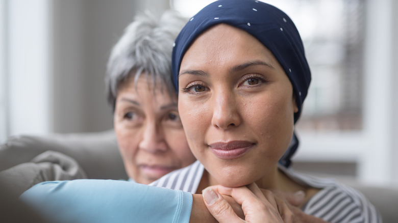young cancer patient with mom