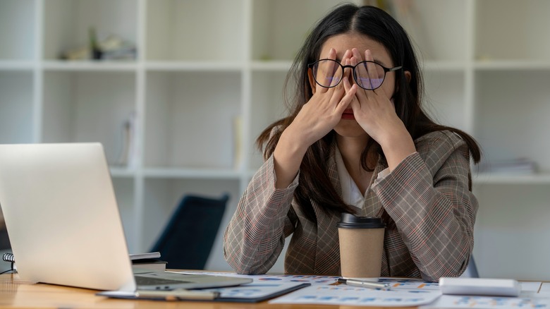 Woman overwhelmed at work