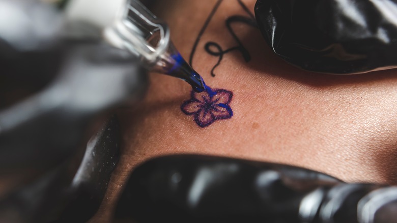 Small flower tattoo