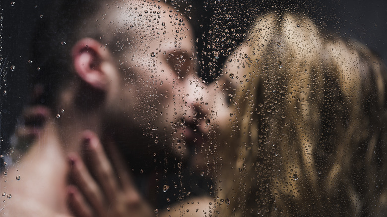 Couple kissing in the shower