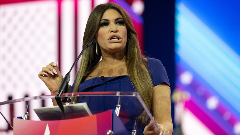 Kimberly Guilfoyle at CPAC in a blue dress