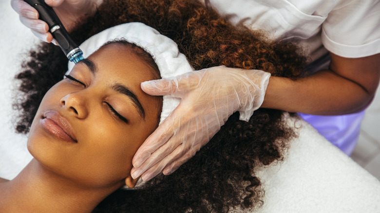 Woman getting facial