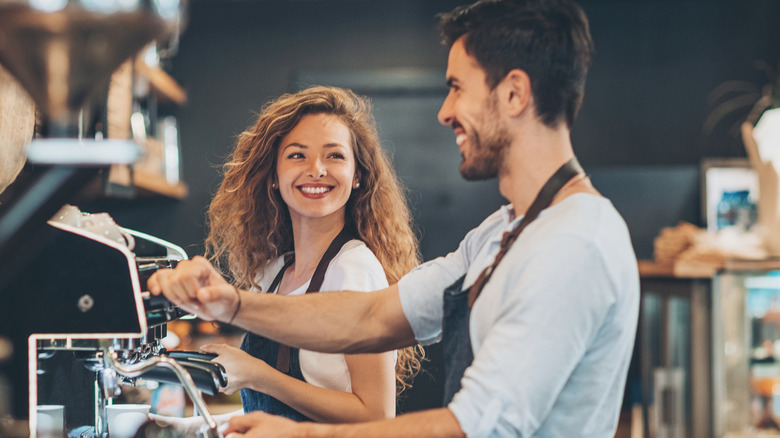 Baristas working together