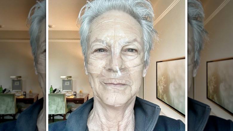 Selfie of Jamie Lee Curtis wearing a translucent face mask