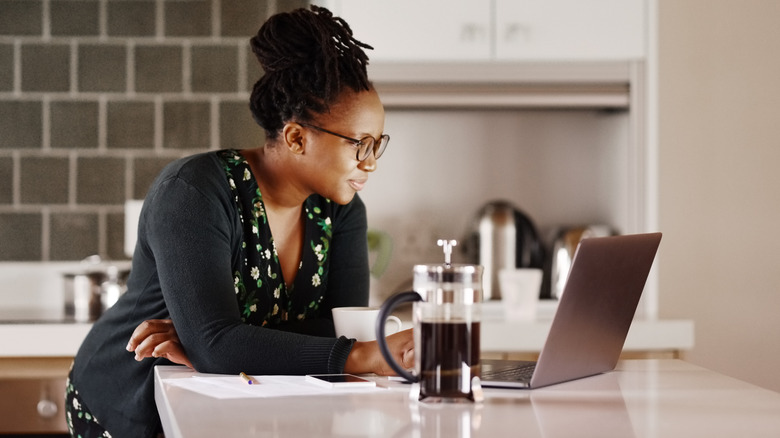 Researching on laptop