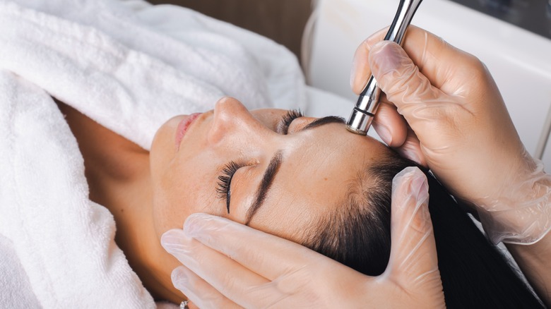 woman getting microdermabrasion