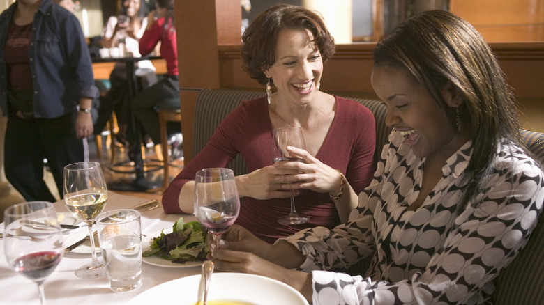 Two friends enjoying a meal