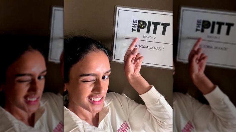 A selfie of Shabana Azeez winking and point to the name on her dressing room door