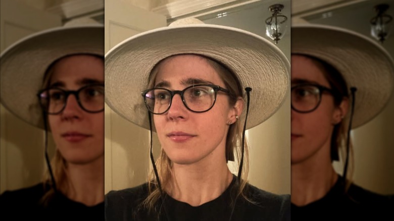 A selfie of Taylor Dearden wearing black classes and a wide-brim hat