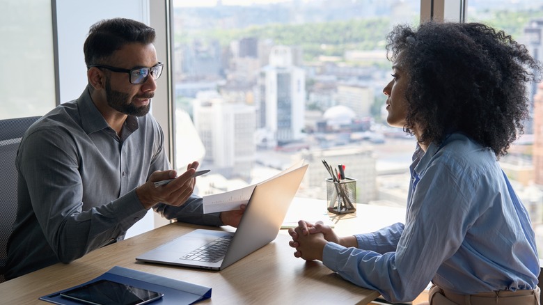 Employee talking to their employer
