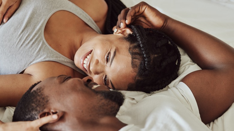 happy couple in bed