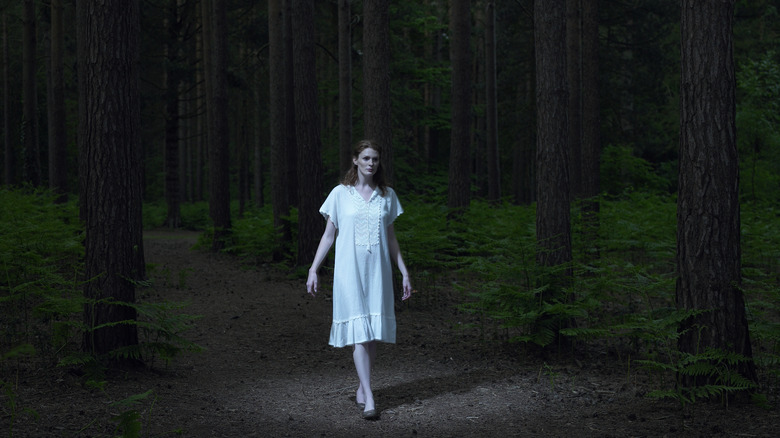 woman alone in forest