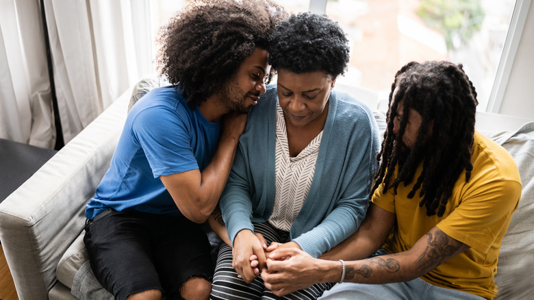 mother talking with sons