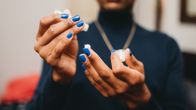 Applying hand cream