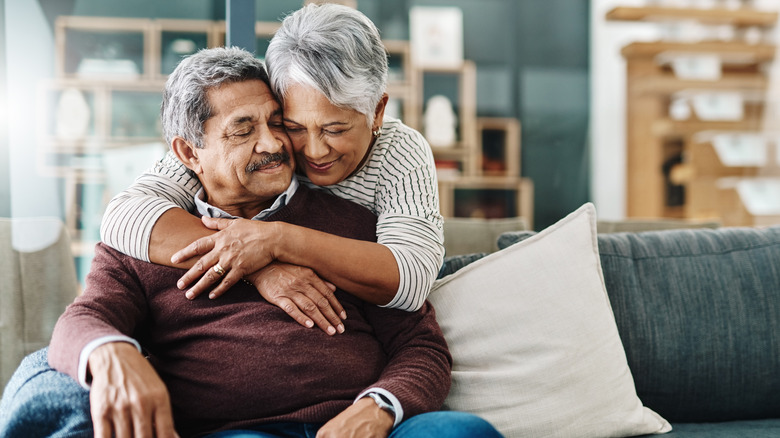 Older couple embracing