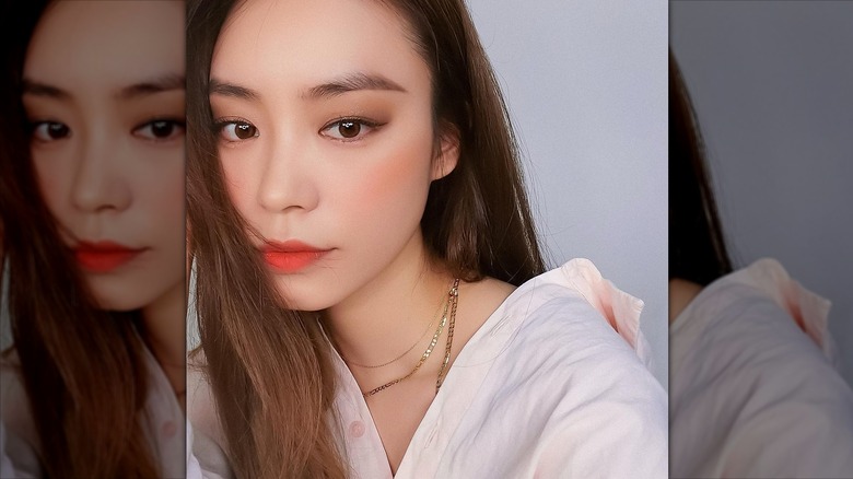 Wearing orange blush