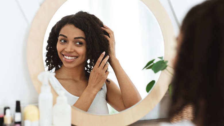 Massaging hair smiling