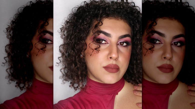 A woman with berry toned makeup