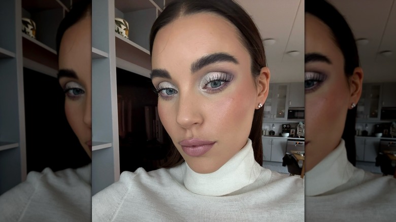 A woman with cool, frosted makeup
