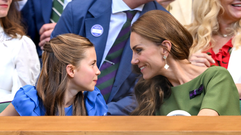 Catherine, Princess of Wales, and Princess Charlotte in the stands at Wimbledon