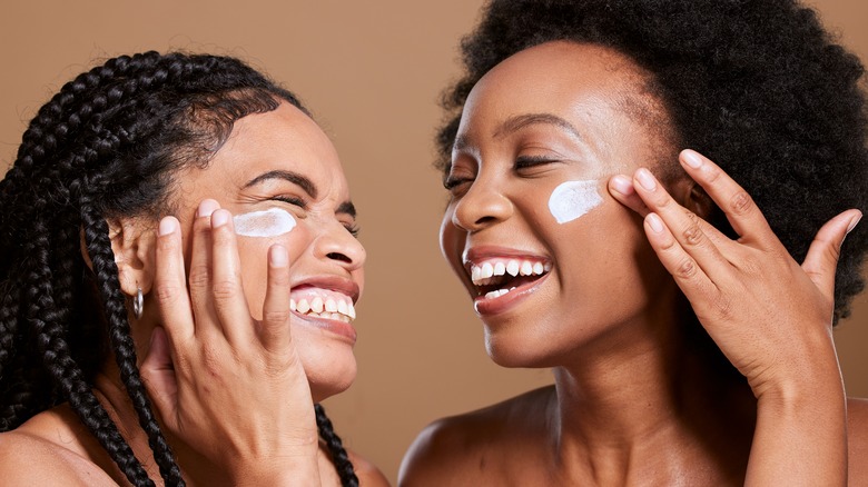 Applying sunscreen
