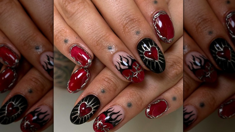 Red and black gothic style nails with chrome details