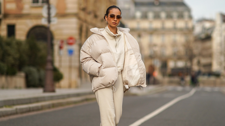 woman in beige outfit