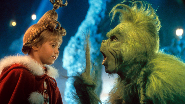 Taylor Momsen as Cindy Lou Who speaking with the Grinch in How The Grinch Stole Christmas