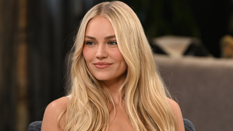 Michelle Randolph wearing her long, blonde hair around her shoulders while attending an IMDb event