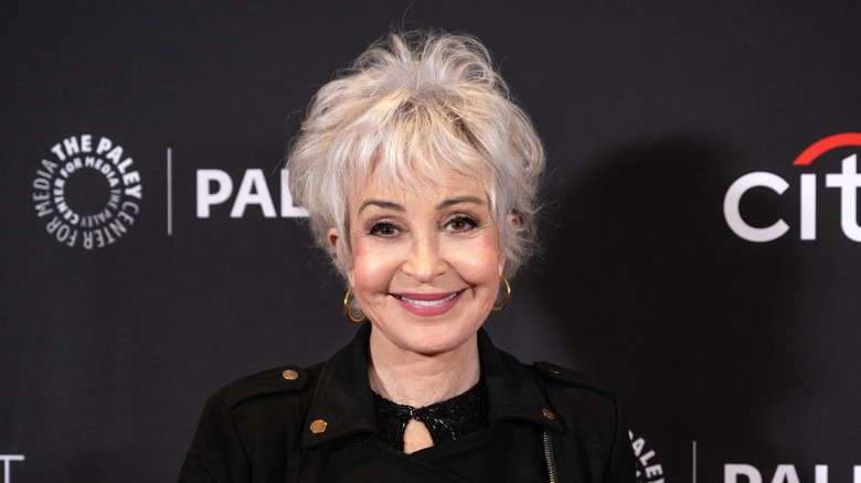 Annie Potts smiles on the red carpet in 2024