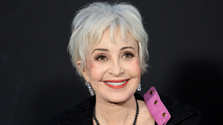 Annie Potts smiles on the red carpet in 2024