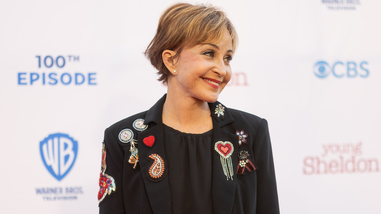 Annie Potts posing with auburn hair at the 2022 premiere of 