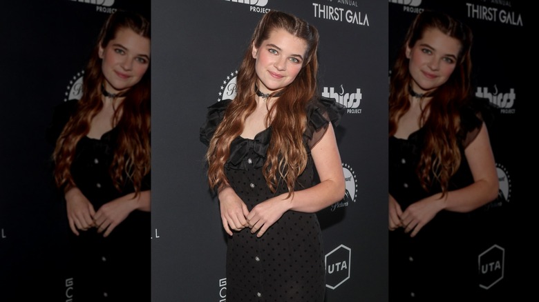 Raegan Revord wearing a long, pinned-back hairstyle at the Thirst Gala