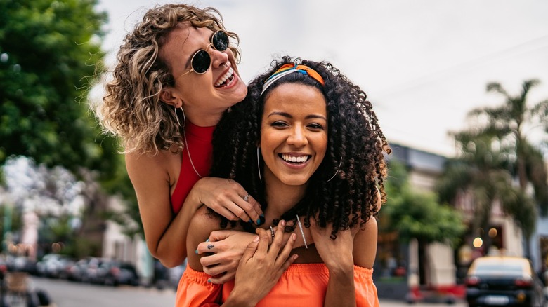 Two friends smiling