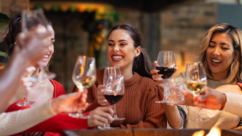 A group of women drinking wine