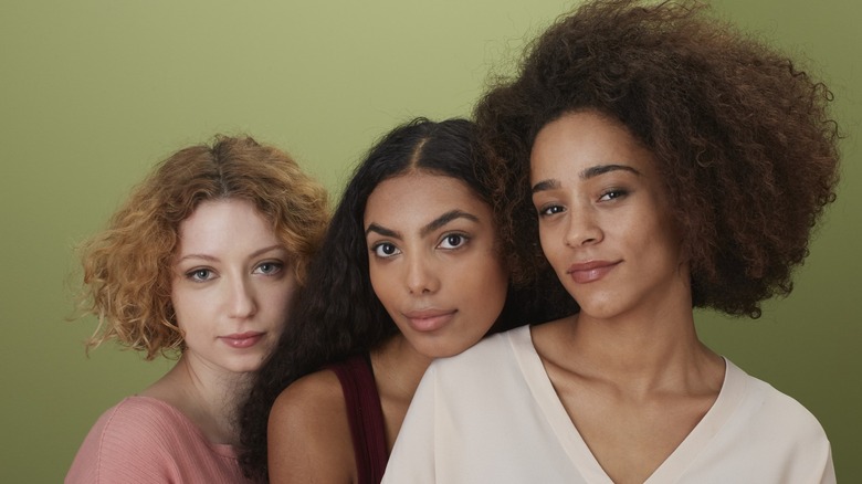 Three women posing together