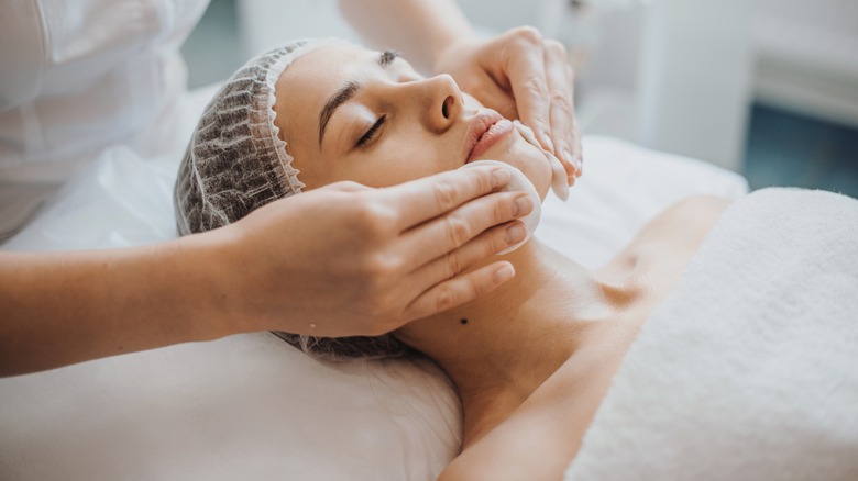 woman getting facial treatment