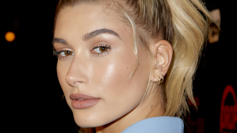 Hailey Bieber posing