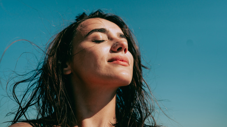 A young woman in the sun 