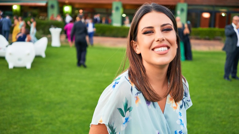 woman bored at wedding