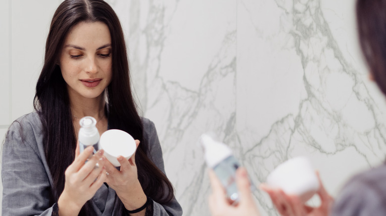 Woman looking at beauty products
