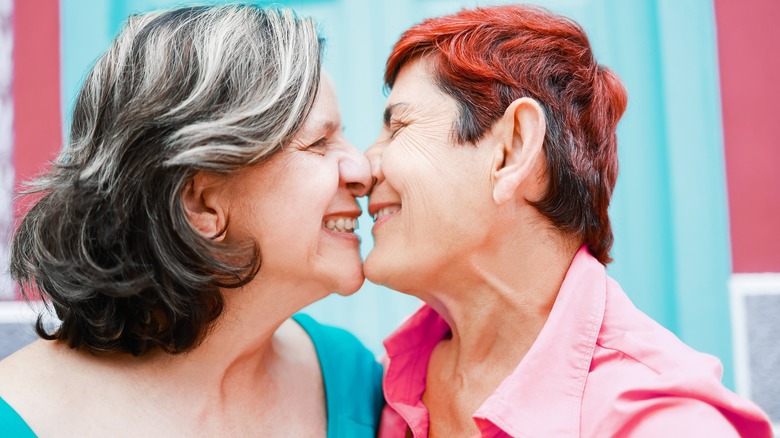 Queer couple kissing