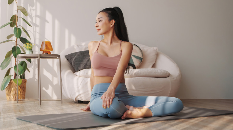 Woman doing wall pilates