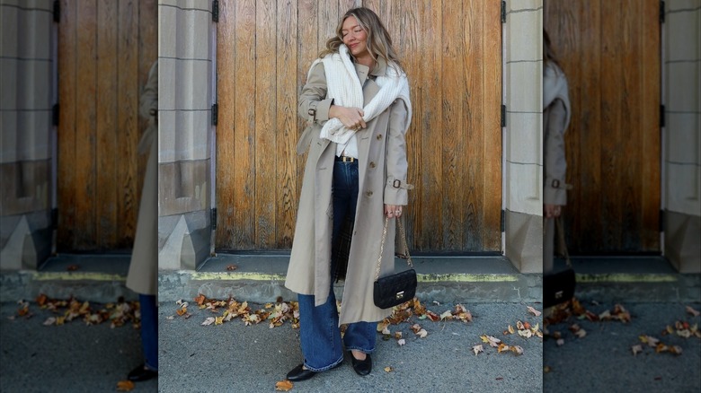 A woman in a trench coat